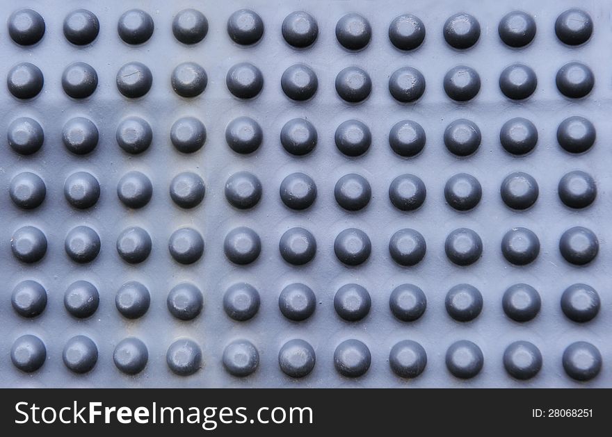 Background of dark relief rubber with circles. Background of dark relief rubber with circles
