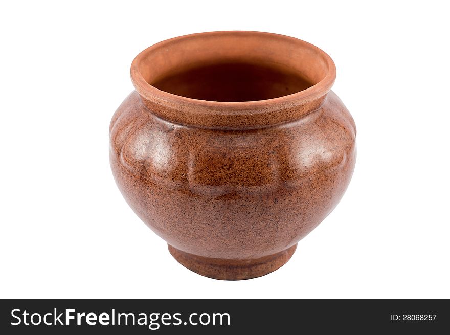 Empty brown clay pot close up