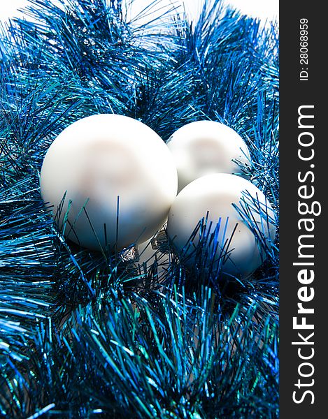 Silver bauble on blue Christmas decoration