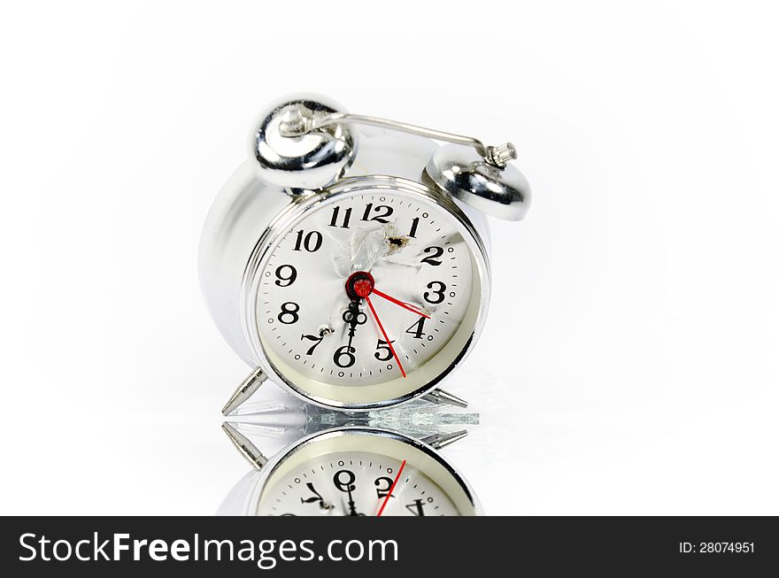 Alarm clock out of order on white background