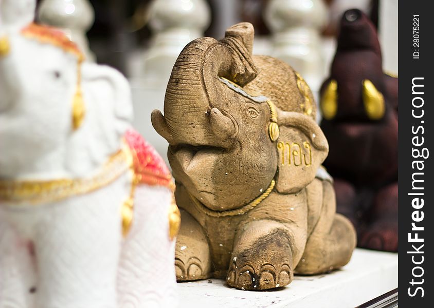 Stone elephant statue near temple, Thailand