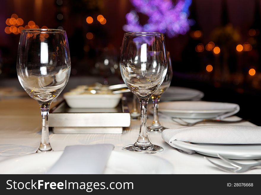 Bright banquet table laid for a festive evening