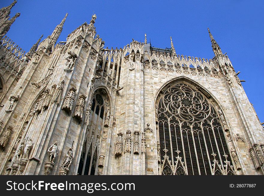 Sevilla cathedral, gothic facade with stain-glasses ; Andalusia, Spain. Sevilla cathedral, gothic facade with stain-glasses ; Andalusia, Spain.