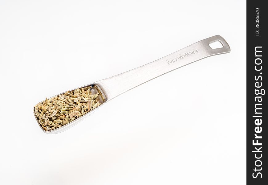 Fennel seeds on white background