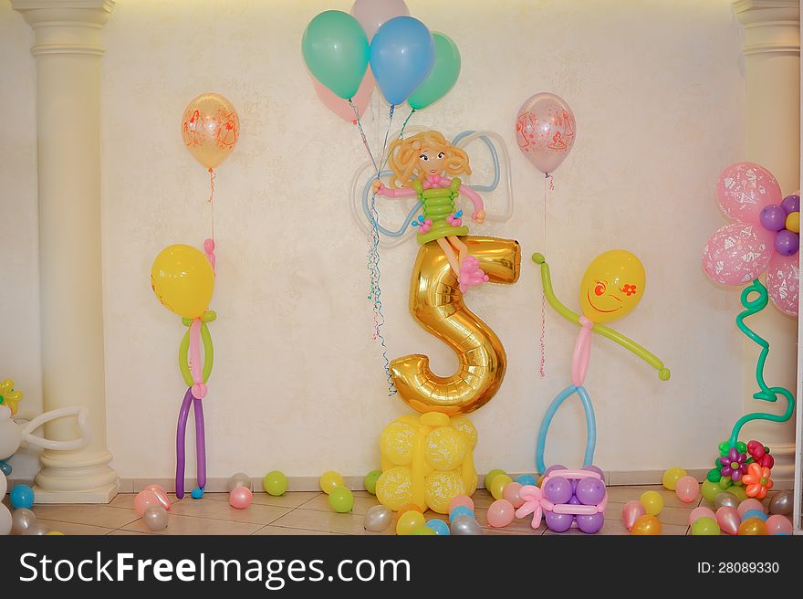 Festive decoration of colored balloons and pieces of them. Festive decoration of colored balloons and pieces of them