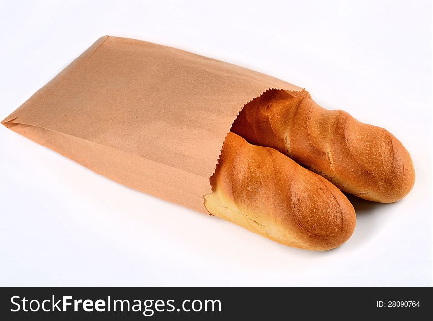 Fresh bread in a package on a white background. Fresh bread in a package on a white background