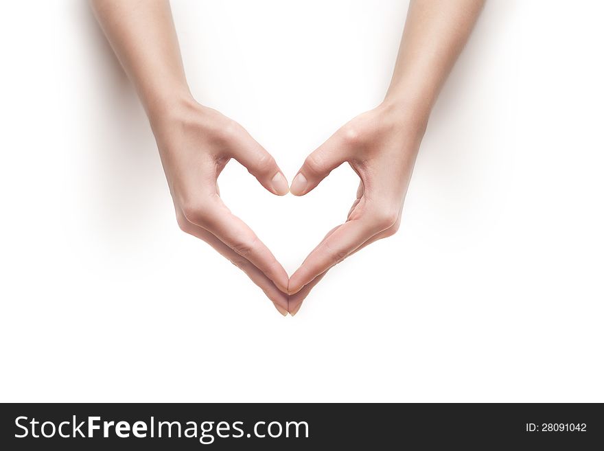 Woman hands show heart gesture isolated on white