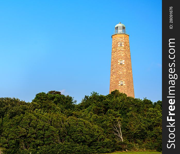 The old Cape Henry Lighthouse located on Fort Story in Virginia Beach, Virginia. Captured in the early morning.