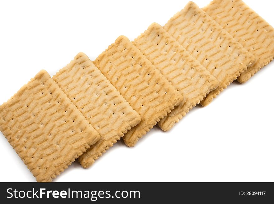 Fresh crackers diagonal arranged white isolated. Fresh crackers diagonal arranged white isolated