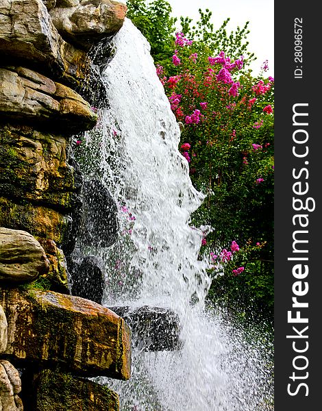 Water cascading down a waterfall.