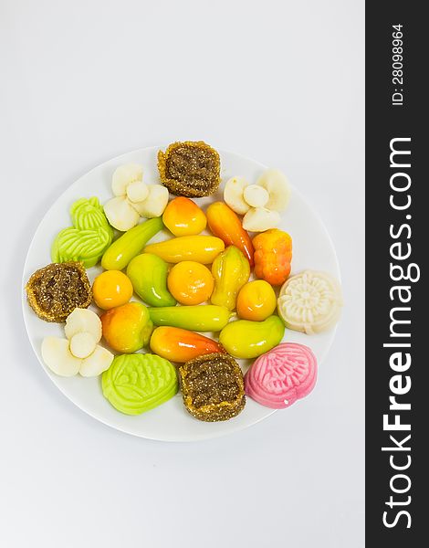 Various colorful Thai dessert on white plate from Phuket shop, Thailand