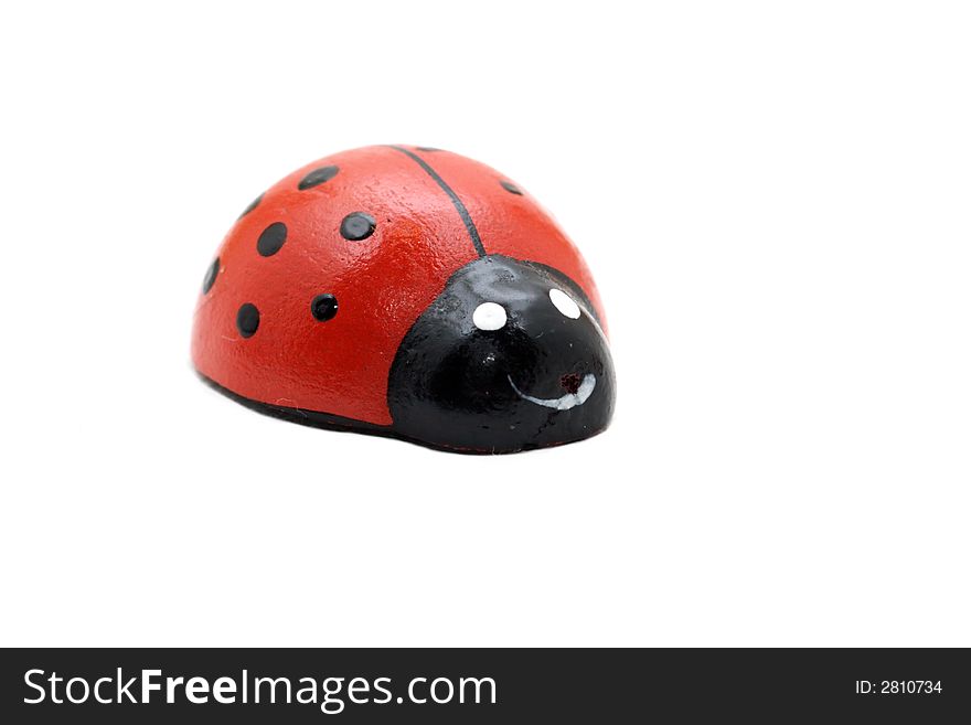 Toy ladybird isolated on white