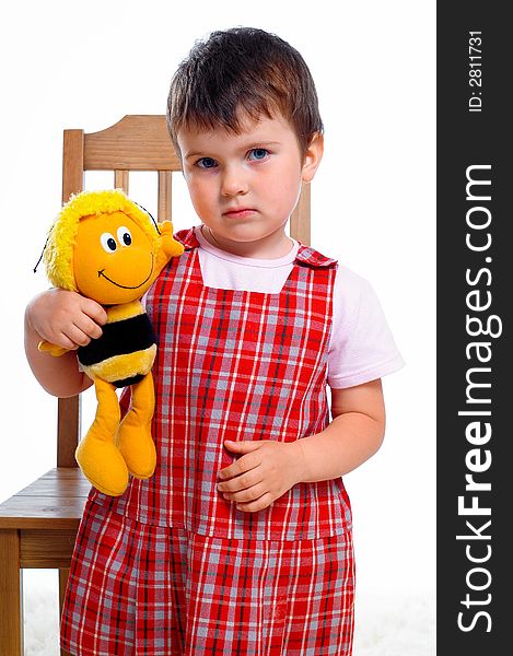 Portrait of little girl with toy