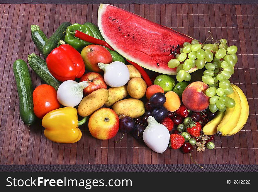 Lots of colorful fruit and vegetables. Lots of colorful fruit and vegetables