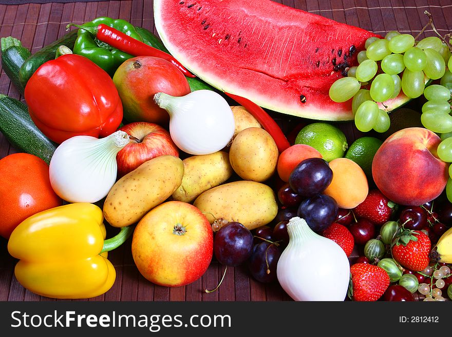 Lots of colorful fruit and vegetables. Lots of colorful fruit and vegetables