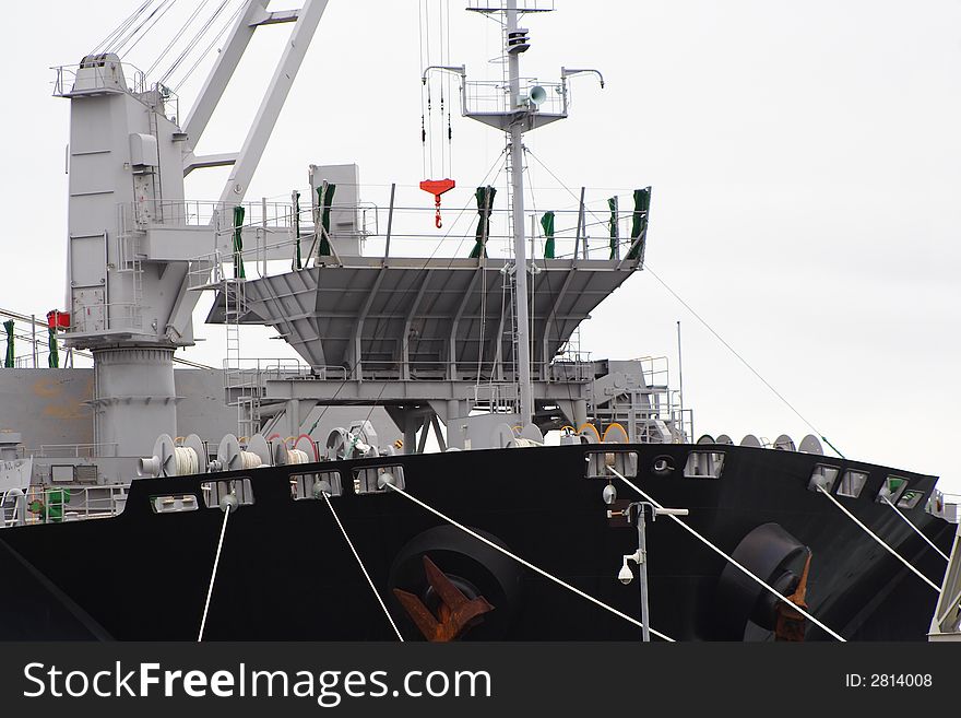 Large cargo ship docked at port