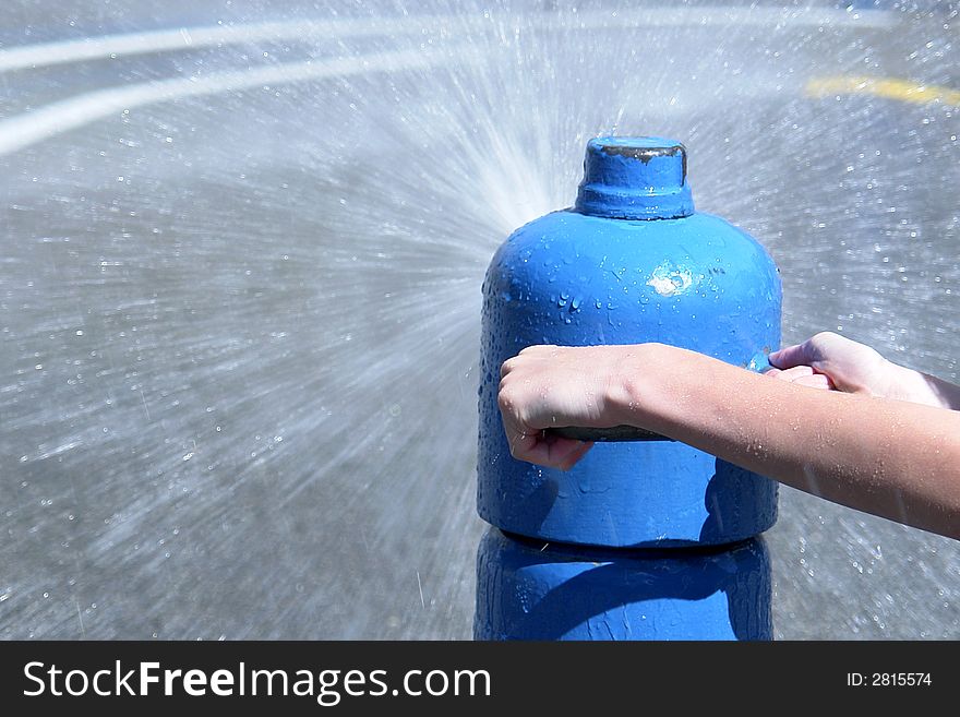 Hands directing the spray at a waterpark. Hands directing the spray at a waterpark