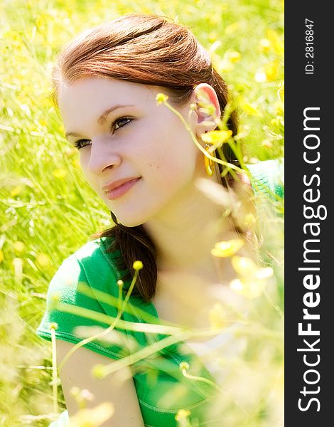 Portrait of a beautiful teen in a sunny field. Portrait of a beautiful teen in a sunny field.