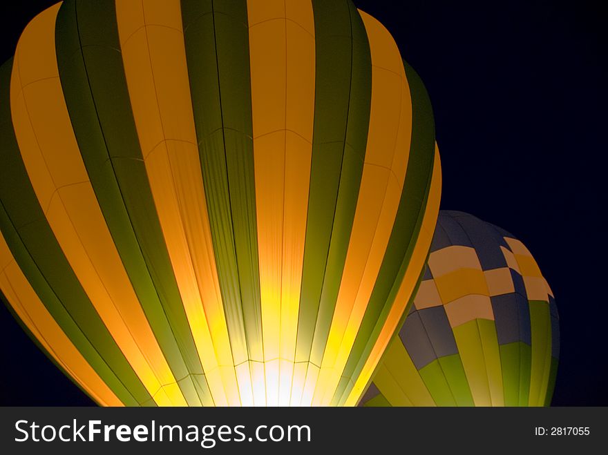 Hot glow from two hot air balloons