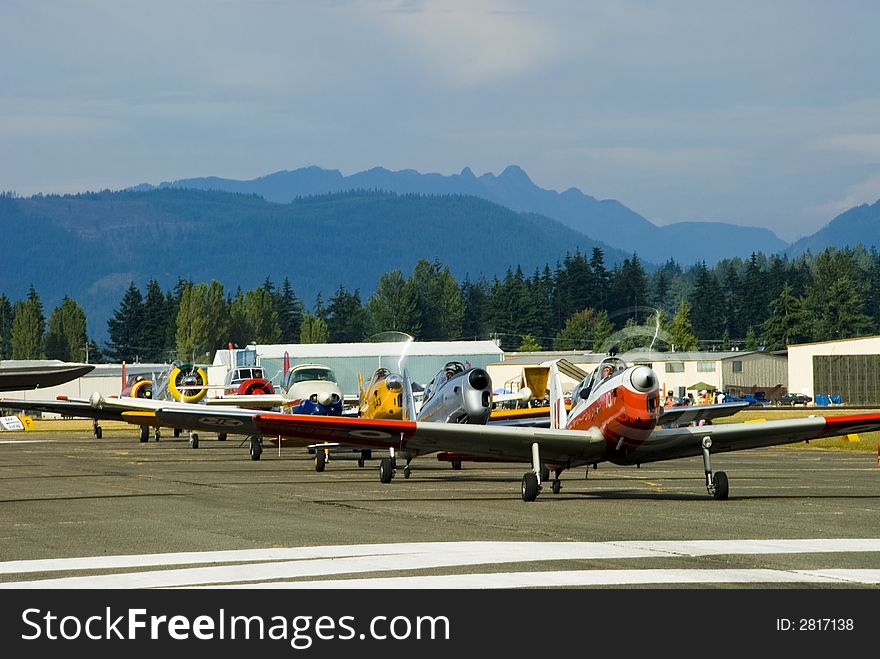 Classic and vintage warbirds on the runway. Classic and vintage warbirds on the runway