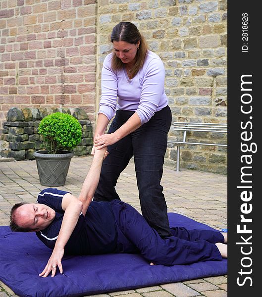 Spinal twist as part of a Thai body massage