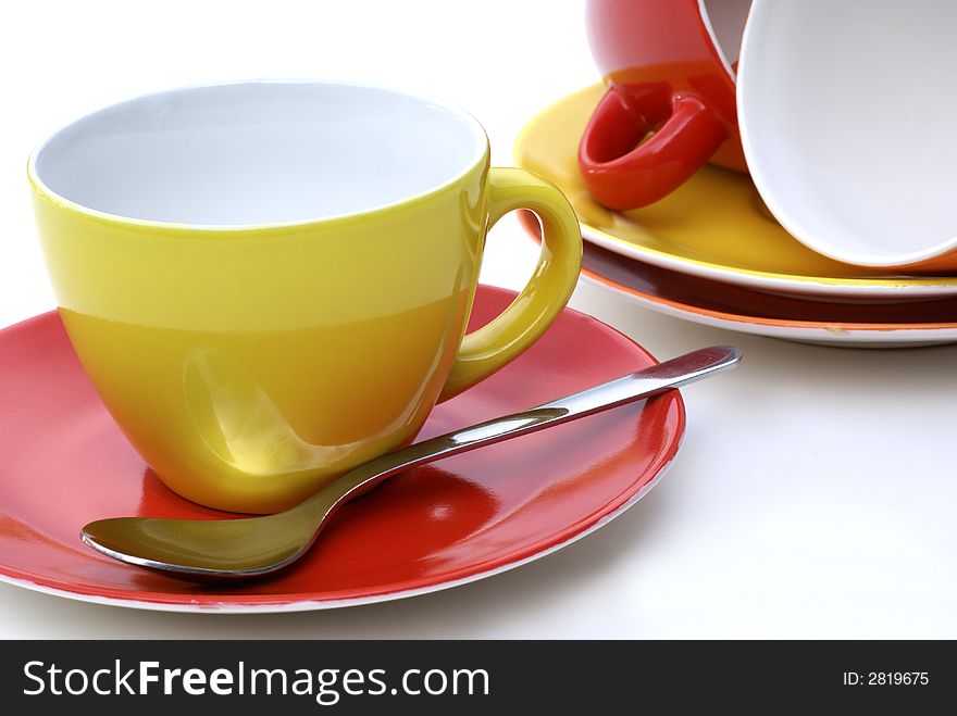 Cups and saucers in multiple colors. Cups and saucers in multiple colors.
