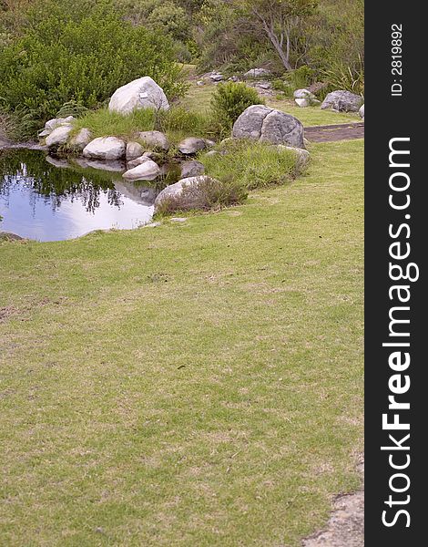 Garden and small lake by the golg course