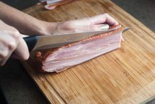 Slicing Bacon Royalty Free Stock Images