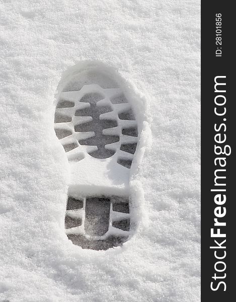One foot prints in fresh snow. One foot prints in fresh snow