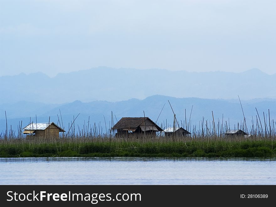 Floating houses of people living on Inle Lake, Myanmar. Floating houses of people living on Inle Lake, Myanmar