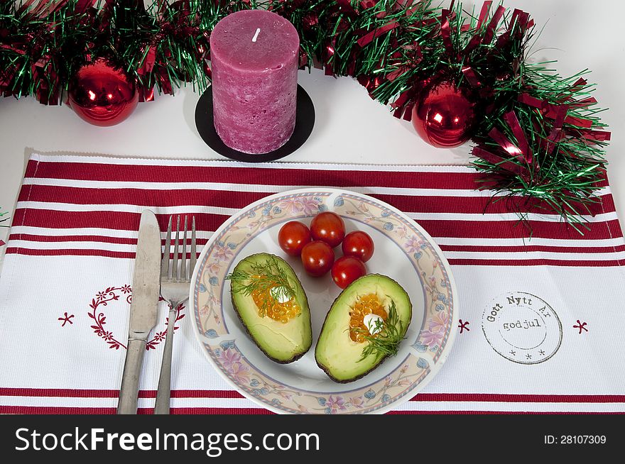 Christmas board candle and avocado canape