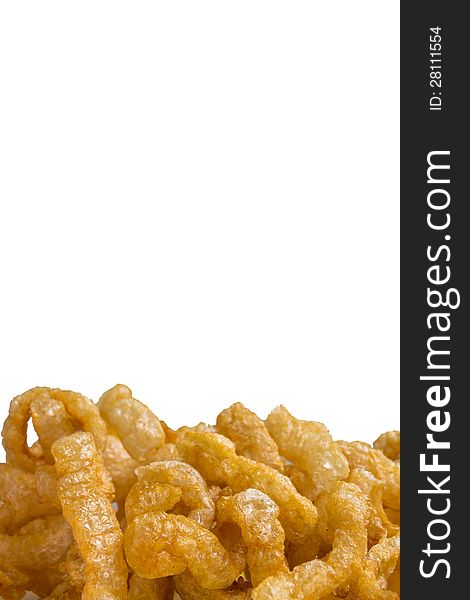 A heap of pork crackling is isolated on white