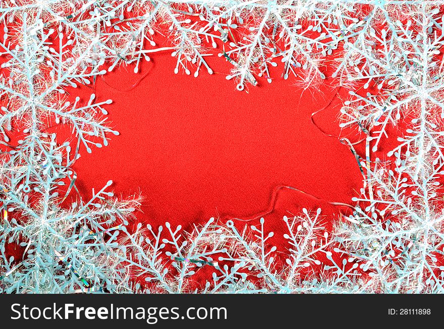 Snowflakes on a red background, christmas decoration. Snowflakes on a red background, christmas decoration