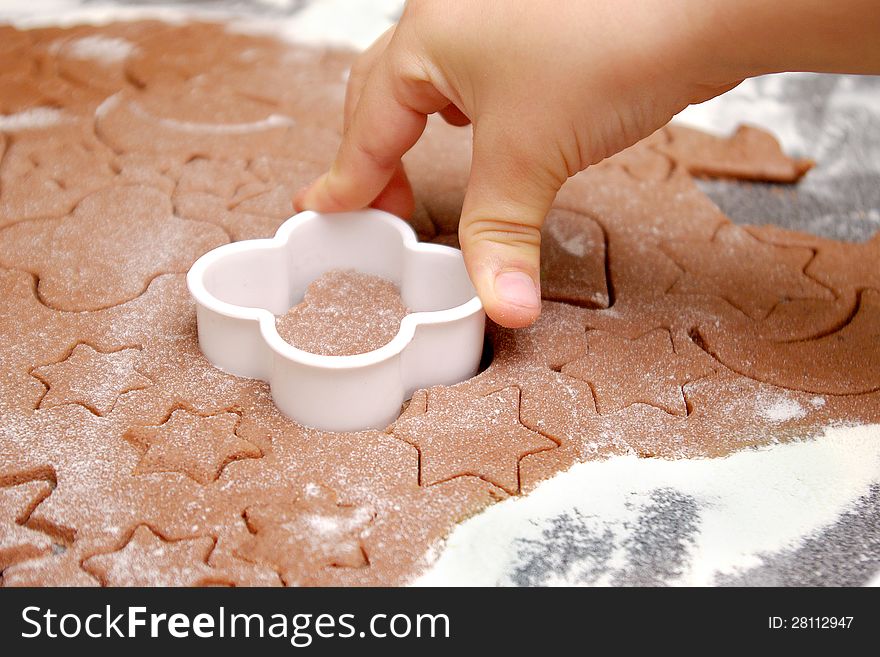 Children make a gingerbread on christmas