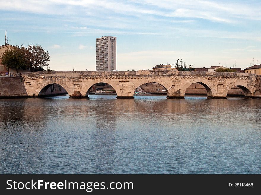 Historical roman Tiberius' bridge over Marecchia river, Rimini, Italy. Historical roman Tiberius' bridge over Marecchia river, Rimini, Italy