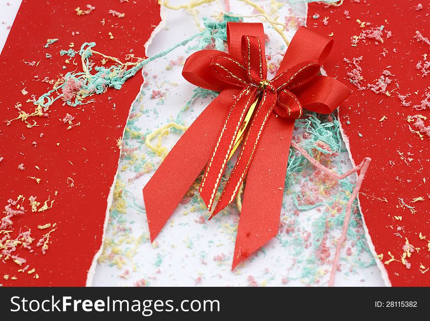 The red ribbon and paper ripped for celebration
