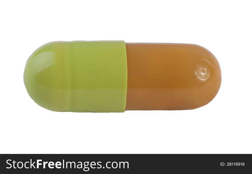 Green Yellow capsule isolated on white background. Green Yellow capsule isolated on white background