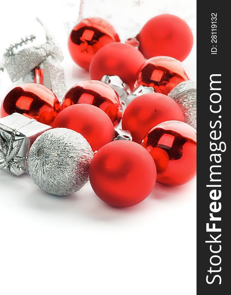 Christmas Red and Silver Baubles and Boxes on white background. Christmas Red and Silver Baubles and Boxes on white background