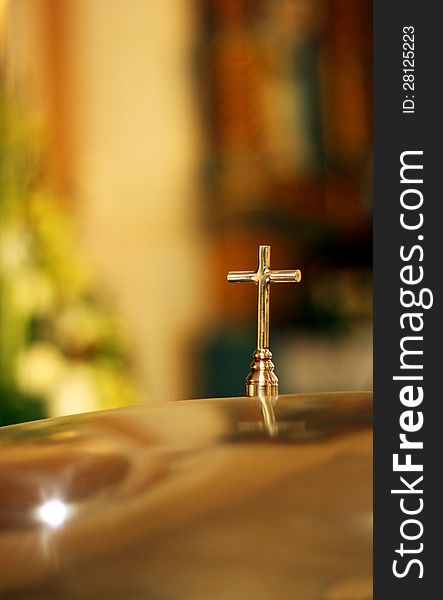 Metal cross with blurred background. Metal cross with blurred background