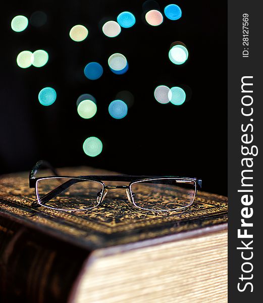 Old Book And Glasses