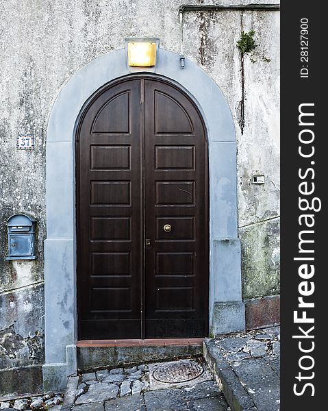 Italian door in small village, Italy