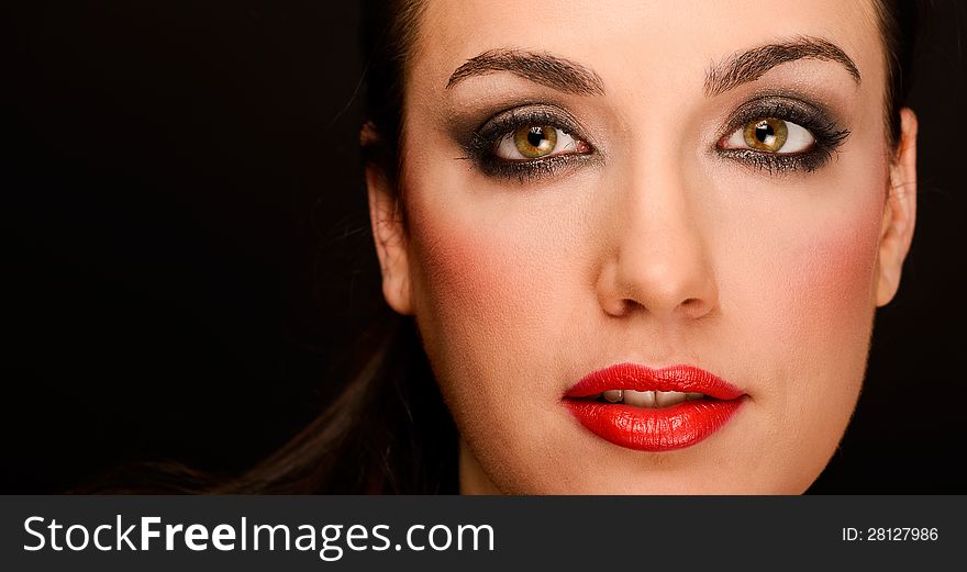 Portrait of attractive girl with red lips. Make up. Perfect skin. Portrait of attractive girl with red lips. Make up. Perfect skin