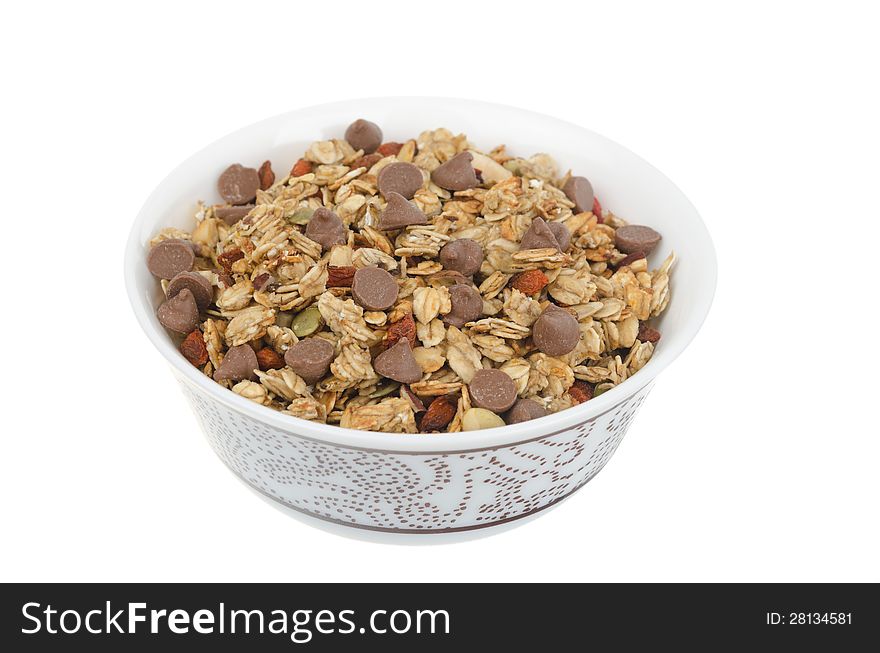 Homemade granola with chocolate drops isolated on a white background