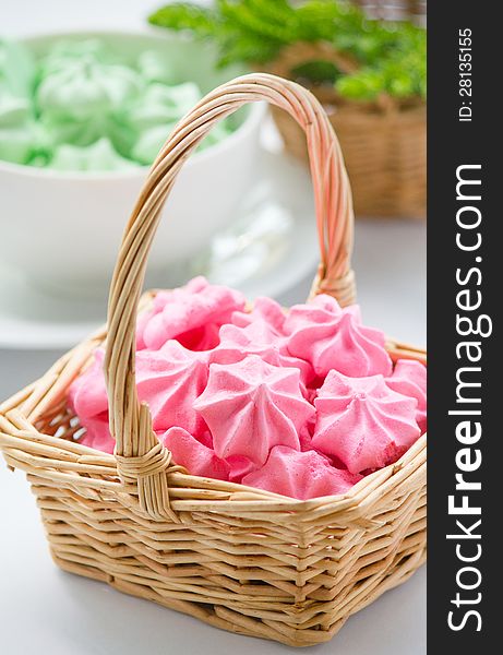 Pink Meringue cookies in basket