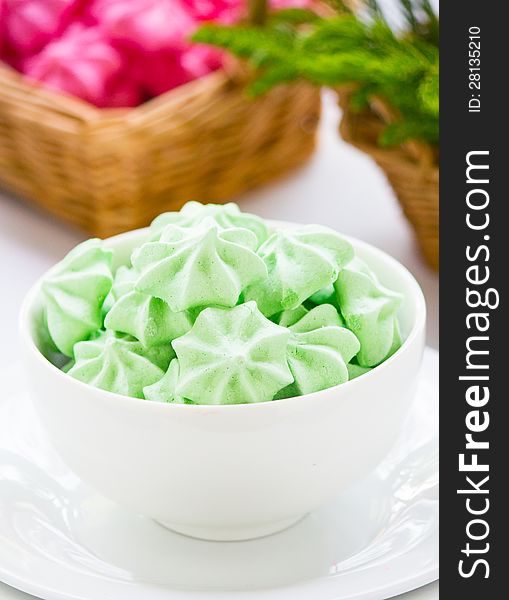 Green Meringue cookies in a bowl