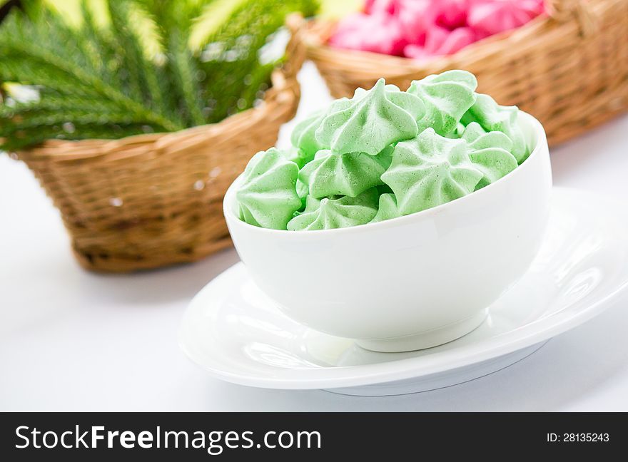 Green Meringue cookies in a bowl