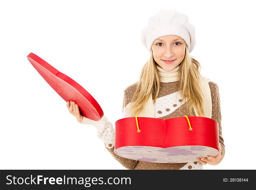 Teen girl holding heart shaped box. Teen girl holding heart shaped box