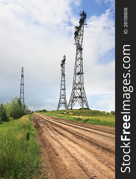 Iron supports for the high-voltage wires. Omsk Region. Russia.