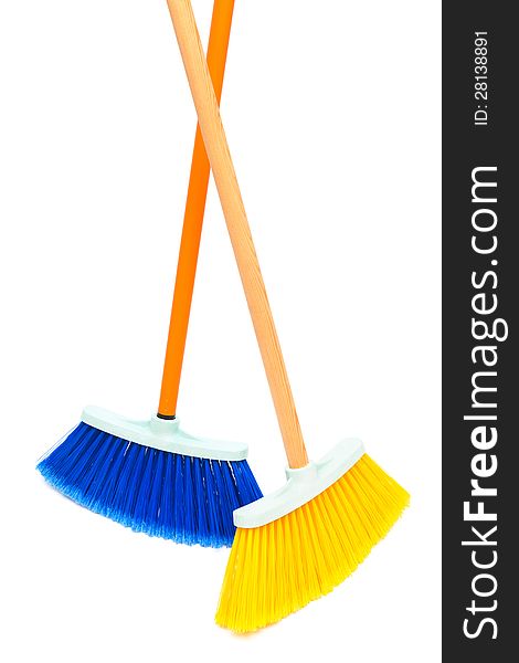 Two brush the floor on a white background