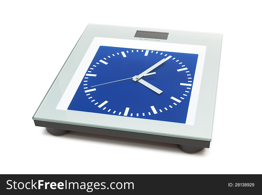 Bathroom scales with the clock on a white background